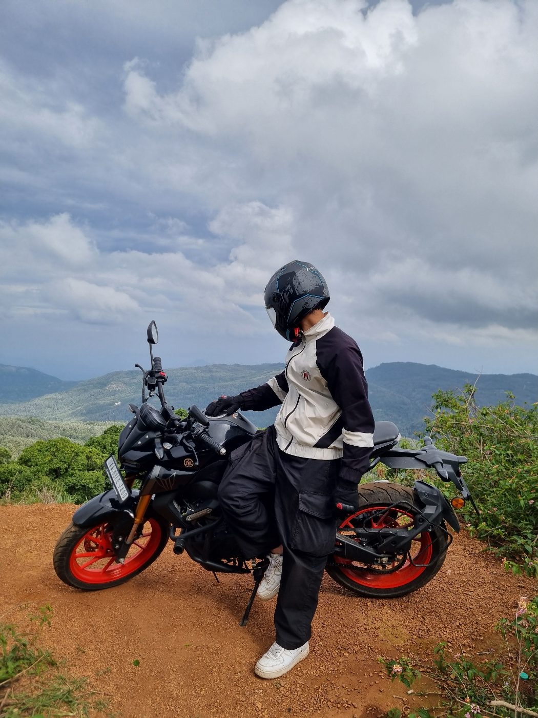 Motorcycle on a red-earth trail