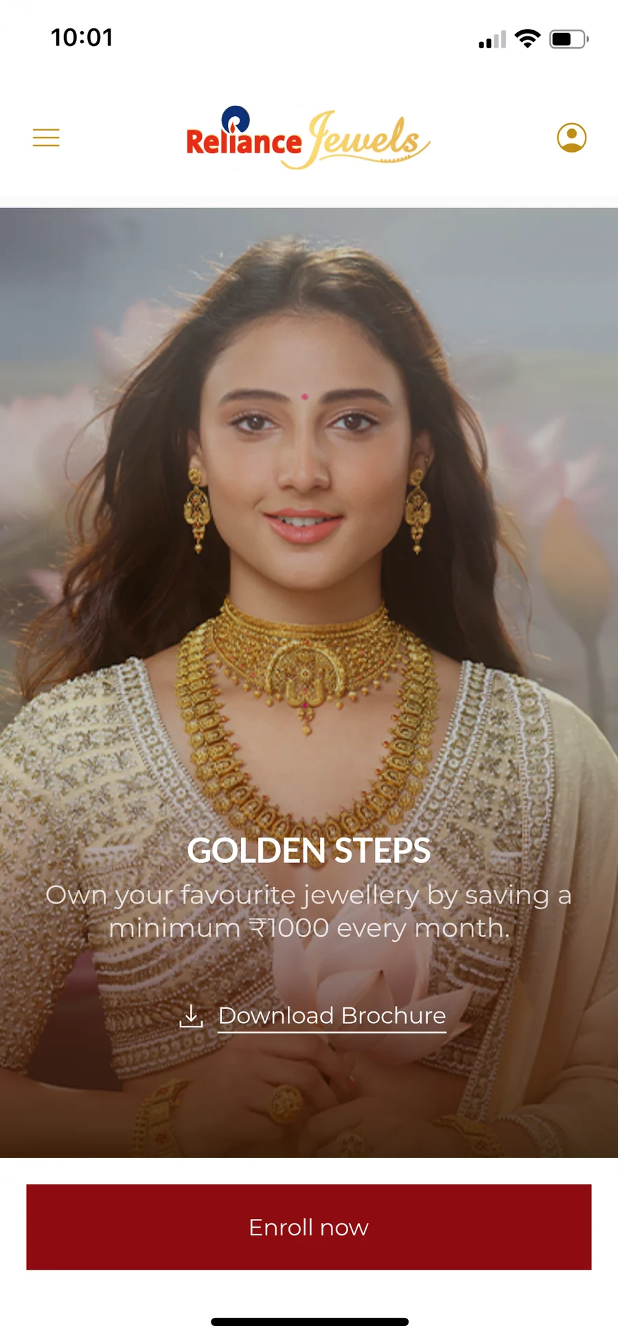 The first Golden Steps landing screen: a model in gold jewellery, the line about saving a minimum of ₹1000 every month, a brochure download and an Enroll now button.